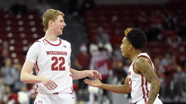 Steven Crowl and Chucky Hepburn celebrate after beating Lehigh.